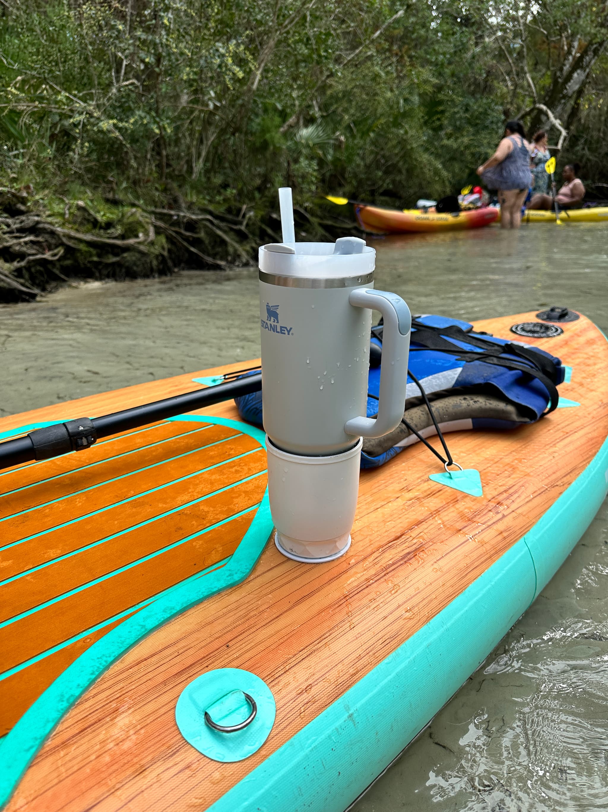 E-Sea Cup Suction Drink holder mounted on an inflatable paddle board in a florida spring