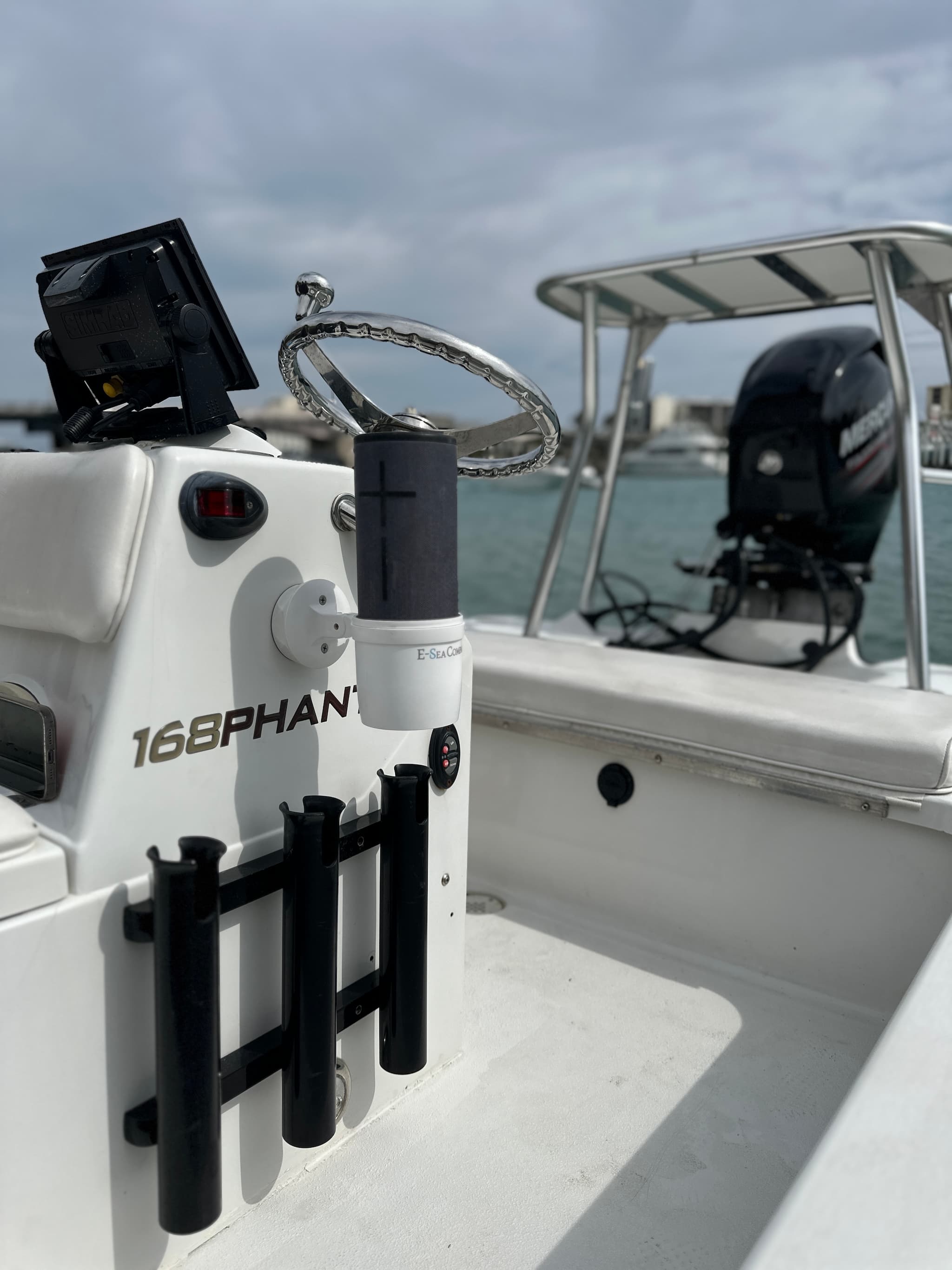 E-Sea Cup Adjustable holding a wireless speaker suction mounted to boat console