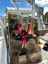 E-Sea Paddle & Utility Clip used as a plier holder on boat console