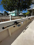 E-Sea Paddle & Utility Clip used as a fishing rod holder on boat gunnel