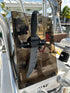 E-Sea Paddle & Utility Clip used as a filet knife holder on boat console
