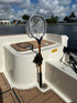 E-Sea Paddle & Utility Clip used as a bait net holder on boat transom