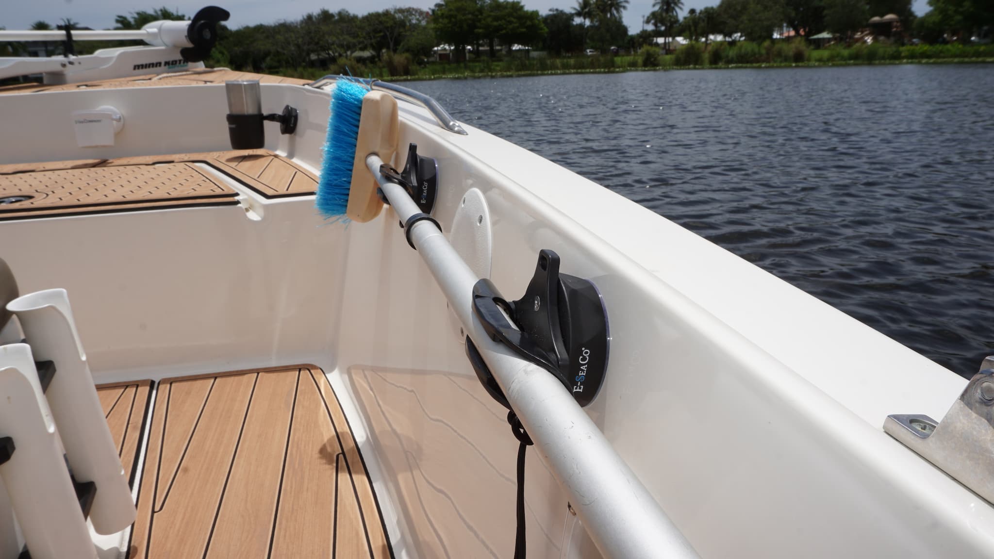 E-Sea Paddle Holder-Suction Mounted Paddle and Utility Clip- On boat gunnel holding boat scrub brush