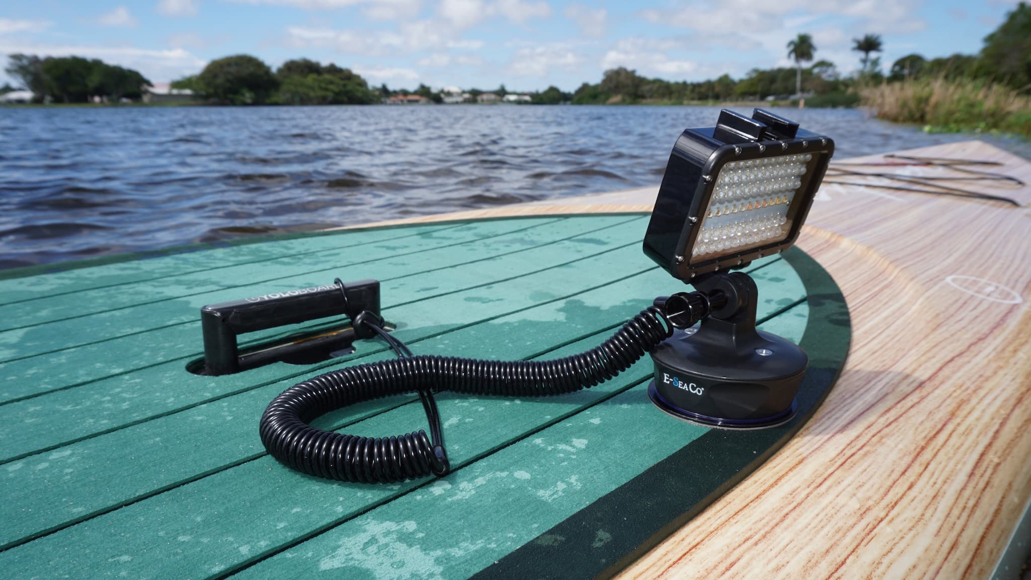 E-Sea Light- Suction Mounted Waterproof Floodlight- Mounted on E-Sea Disc on top of hard paddle board with E-Sea Tether for extra security