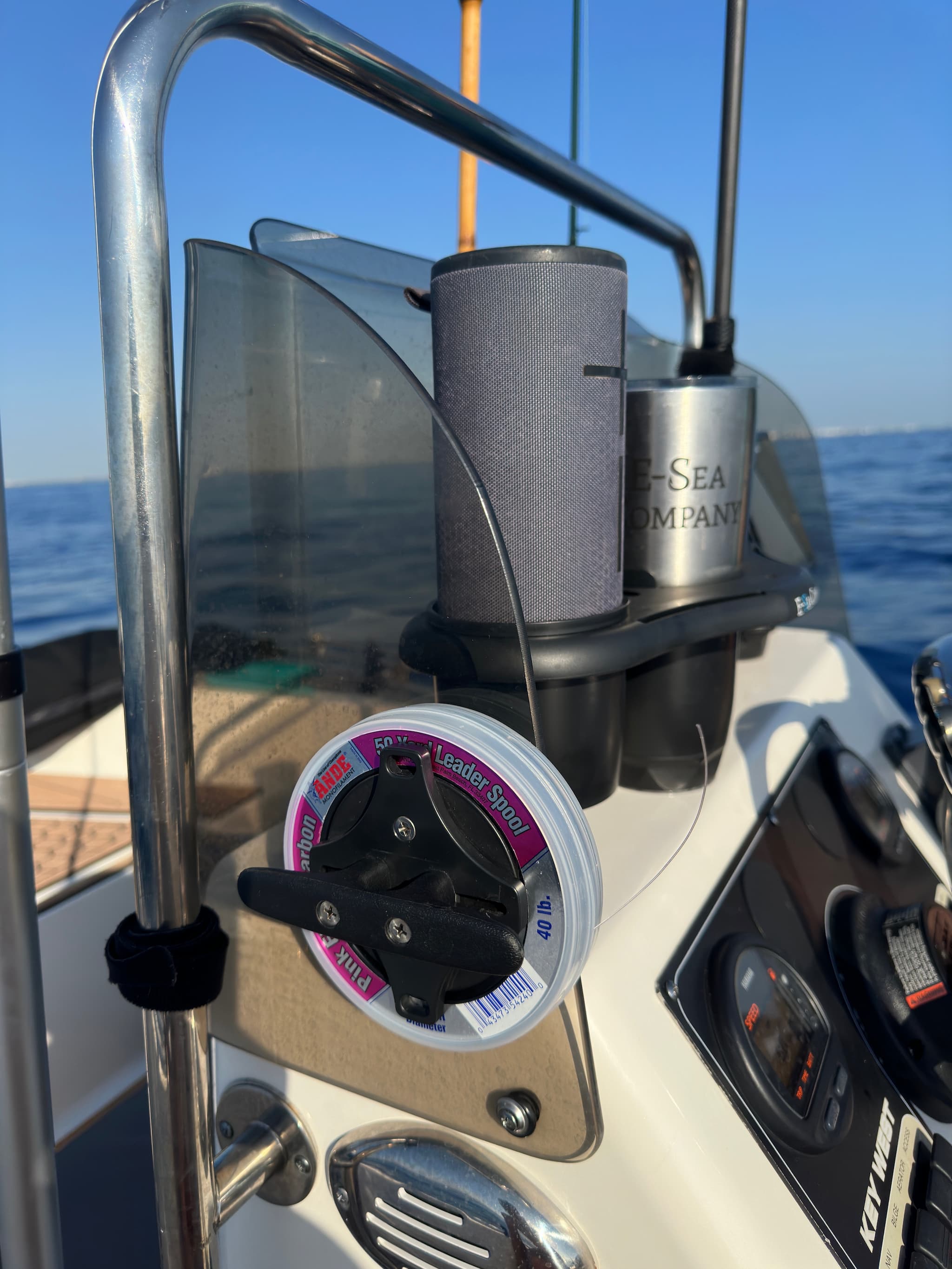 E-Sea Cleat suction mounted to boat console holding a fishing leader spool