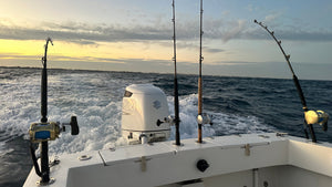  Fishing boat with multiple fishing rods utilizing the E-Sea Fishing Rod Tether. Also featuring the E-Sea Bottle Opener. 