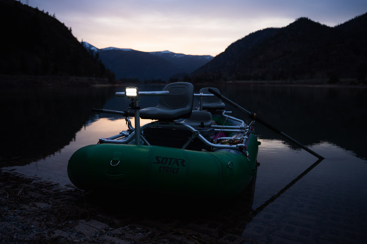 E-Sea Light attached to floating sotar river raft on a river in the mountains